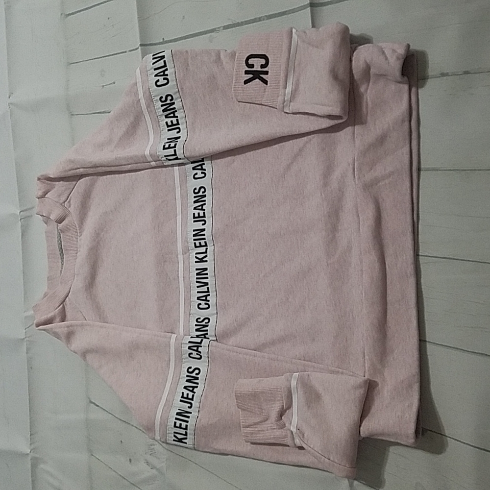 Women's s pink Calvin Klein sweatshirt with logo all around